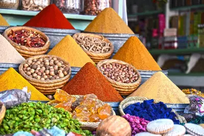 a display of spices and other ingredients in a market at Pestana CR7 Marrakech in Marrakech