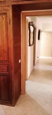 an empty room with a door and a hallway at Twins 13 in Marrakech