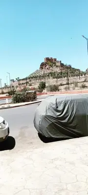 a car with a cover on the side of a road at Twins 13 in Marrakech