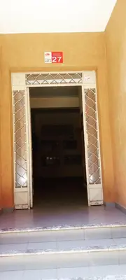 a large entrance to a building with a door at Twins 13 in Marrakech