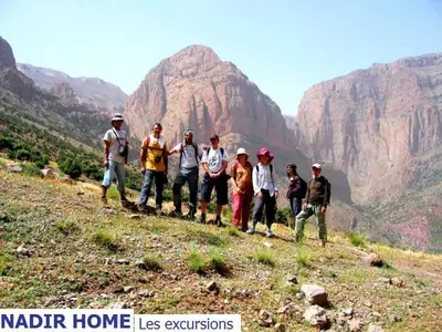 a group of people standing on top of a mountain at Nadir Home in Marrakech