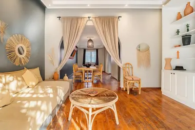 a living room with a couch and a table at Villa Lila in Marrakech