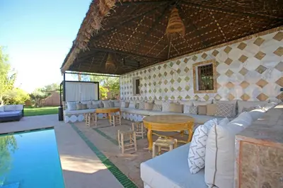 a rendering of a patio with a table and chairs at Domaine DAR JMEL & Dar Abi Samama in Marrakech