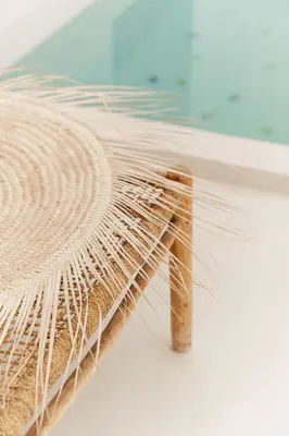 a pile of straw sitting on top of a table at Riad La Lumière d'Étoile in Marrakech
