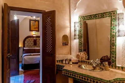 a bathroom with a sink and a mirror at Room in BB - Riad Anabel - Chocolat Double Room in Marrakech