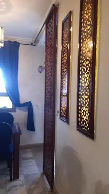 a room with a door and a wall with a window at marrakech palmeraie village Etablissement jasmin in Marrakech