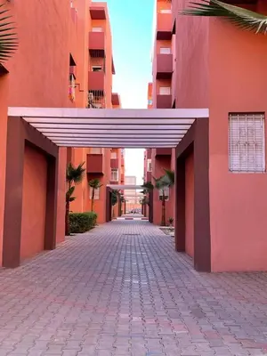 an empty hallway of a building with a walkway at Appartement zen in Marrakech