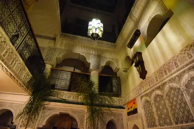 a room with a ceiling with a chandelier in a building at Riad Vis Ta Vie in Marrakech