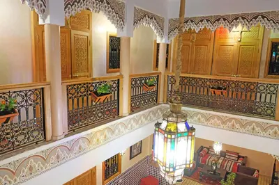 a building with a chandelier hanging from the ceiling at Riad ZANOUBA in Marrakech