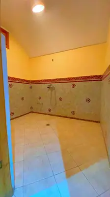 an empty room with a room with a tile floor at Villa Marrakech in Marrakech