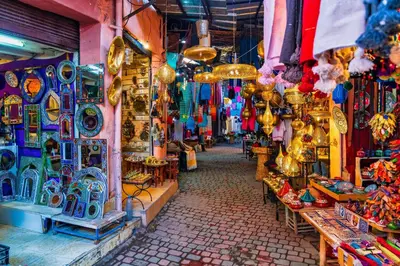 a market with a lot of different items on display at Dar Baddi in Marrakech
