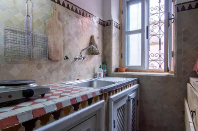 a kitchen with a sink and a window at The Loft in Marrakech