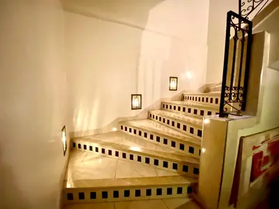 a set of stairs in a building at Riad Jibraile in Marrakech