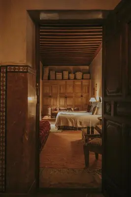 an open door to a bedroom with a bed at Riad Samsara in Marrakech