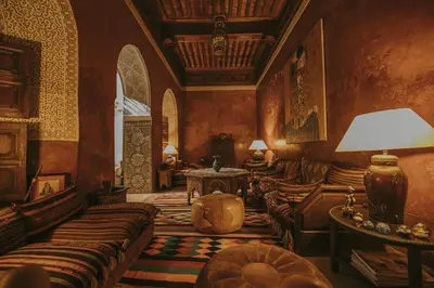 a living room with a couch and a table at Riad Samsara in Marrakech