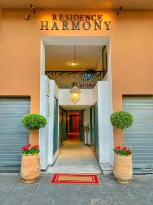 a hallway leading to a residence hambury building at Vitality Home in Marrakech