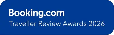 a blue and white sign with the words travelling review awards at Riad Sofia signature in Marrakech