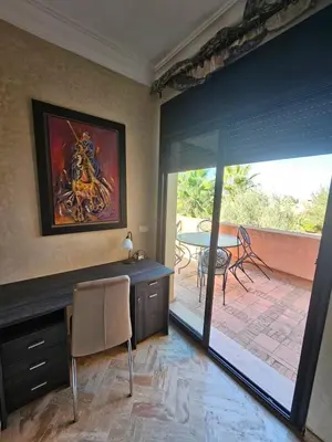 a living room with a view of a patio at atlas golf resort marrakech 