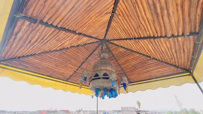 a chandelier is hanging from a roof at Riad dar Rbati in Marrakech