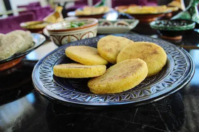 a plate of donuts on a table at Majorel Perle Hôtel Riad Restaurant Picine & Spa in Marrakech