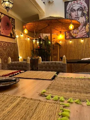 a room with a table with bananas on it at Riad Paradise privatisé au cœur des souks in Marrakech