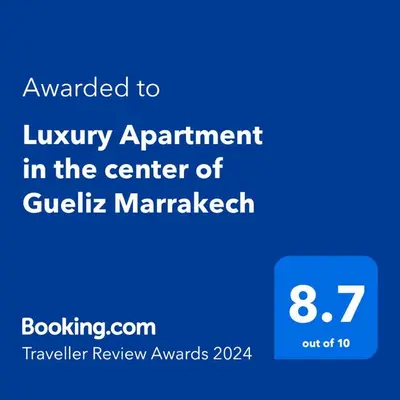 a screenshot of the library appointment in the center of gillez marwerwer at Luxury Apartment in the center of Gueliz Marrakech in Marrakech