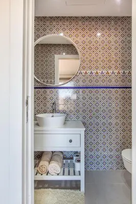 a bathroom with a sink and a mirror at ZARI Boutique ApartHotel in Marrakech