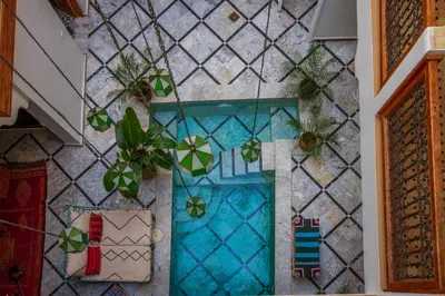 an overhead view of a swimming pool in a house at Riad SofYan & Spa in Marrakech