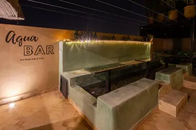 a restaurant with a bar sign on a wall at Riad SofYan & Spa in Marrakech