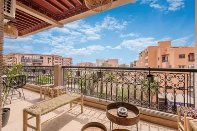 a balcony with a view of a city at L'Atelier N°12, Loft, Terrasse in Marrakech