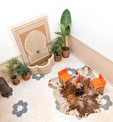 a room with potted plants on the floor at Riad21 in Marrakech