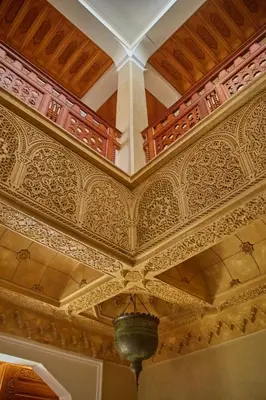 a coffered ceiling in a room with a chandelier at Villa Taj Sofia & Spa in Marrakech