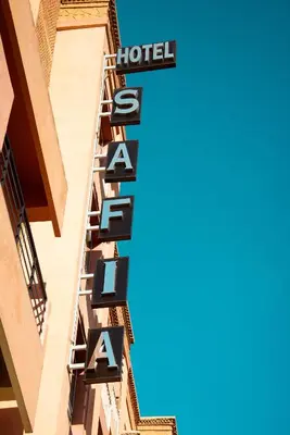 a hotel sign on the side of a building at Hotel Safia in Marrakech