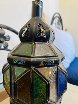 a group of stained glass lanterns sitting on a table at Riad MS holidays terrasse privatisé Marrakech in Marrakech
