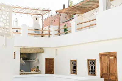 two views of the inside of a house at Riad Rahal in Marrakech