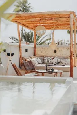 a living room with a couch and a table at Kenzara Suites & Pool, Your private escape in Marrakech