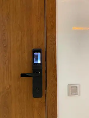 a cell phone sticking out of a door at Oasi Marrakech in Marrakech
