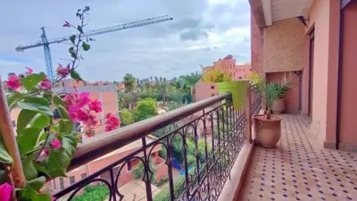 a balcony with a view of a city at Résidence Anas Majorelle -Centre Ville in Marrakech