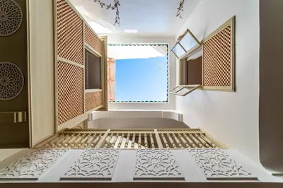 an empty room with a window and a bed at Riad Kasbabouch - Breakfast - 10mn to Jamaa Al Fna in Marrakech