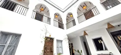 a room with white walls and windows and a ceiling at RIAD 48 & SPA in Marrakech