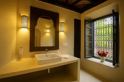 a bathroom with a sink and a window at BKAN RIAD MARRAKECH in Marrakech