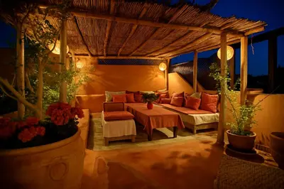a living room with a couch and a table at BKAN RIAD MARRAKECH in Marrakech