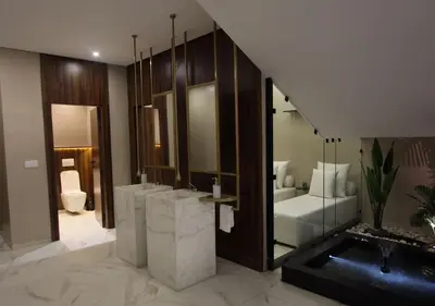a bathroom with a sink and a toilet and a tub at Vista de La Palma in Marrakech