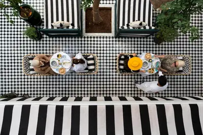 an overhead view of a table with people eating food at Riad Botanica in Marrakech