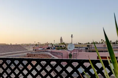 a view of a city from a balcony at RIAD DAR C in Marrakech