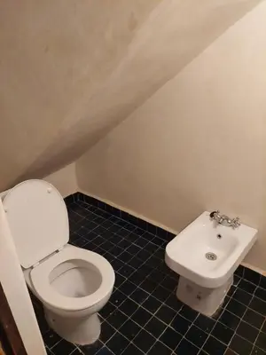 a bathroom with a toilet and a sink at Beldi Riad in Marrakech