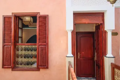 a door and a window on a house at RIAD MARRAKECH DOORS in Marrakech