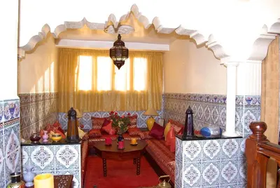 a living room with a couch and a table at Chez Peyo in Marrakech