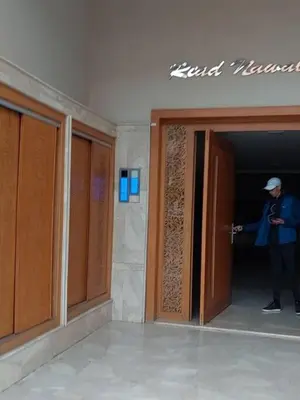a man standing in the doorway of a building at Morooco Home in Marrakech