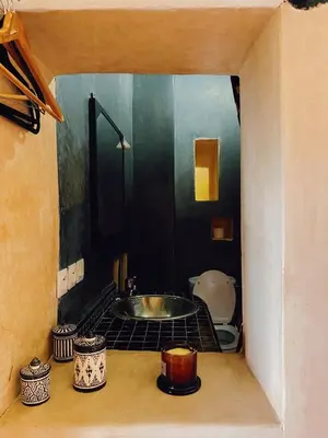 a bathroom with a sink and a toilet at Riad Sidi Radoine in Marrakech